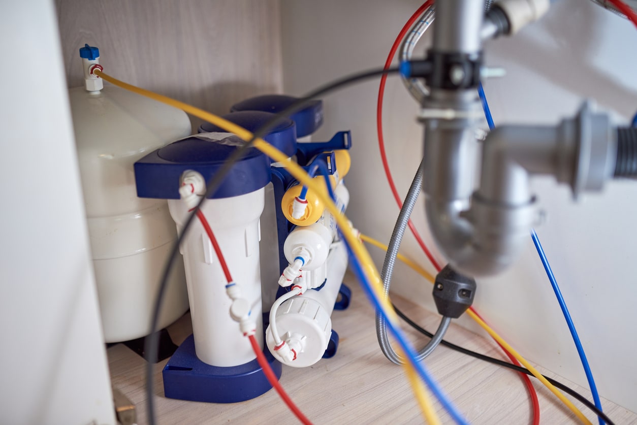 A reverse osmosis water filtration system underneath a sink of a home in San Francisco